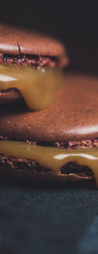 Chocolate macarons with caramel filling
